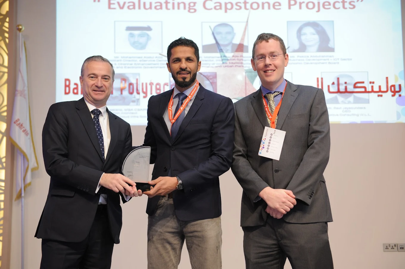 Maroon Frog team receiving recognition from Bahrain Polytechnic.